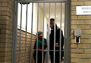 Duduzane Zuma greeting staff at the Randburg court.