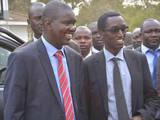 Governor Mandago with bussinesman Buzeki at a meeting on Eldoret on January 9th