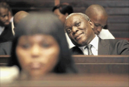 FLASHBACK: State Security Minister Siyabonga Cwele sits in court during his ex-wife's drug case