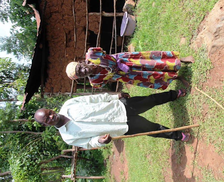 Morris Ndimu with his grandmother Robai Nasike at their Sipande vilage home in Lugari