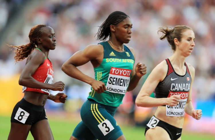 (L-R) Winny Chebet of Kenya, Caster Semenya of South Africa and Nicole Sifuentes of Canada competes in the Women's 1500 metres heats during day one of the 16th IAAF World Athletics Championships London 2017 at The London Stadium on August 4, 2017 in London, United Kingdom