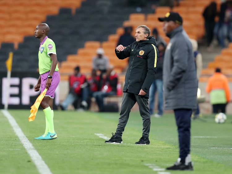 Kaizer Chiefs' Italian coach Giovanni Solinas (far left) looks on alongside his Black Leopards counterpart Joel Masutha during an Absa Premiership match at FNB Stadium in Johannesburg on November 7, 2018. Chiefs won 1-0.