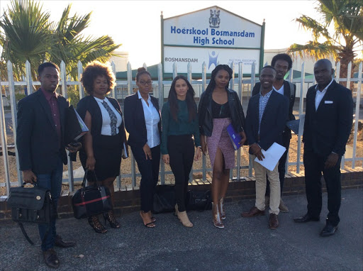 From left to right: Chamber of Legal Students members outside Bosmansdam high school last Wednesday - chairman Yolisa Nocanda, Aza Nongoma, Khanyisa Monqo, Shanèca Smal, Kimberly Mthembi, Kwanda Mkalipi, Sonke Mamba (with an Afro) and Simfanele Mavuso.