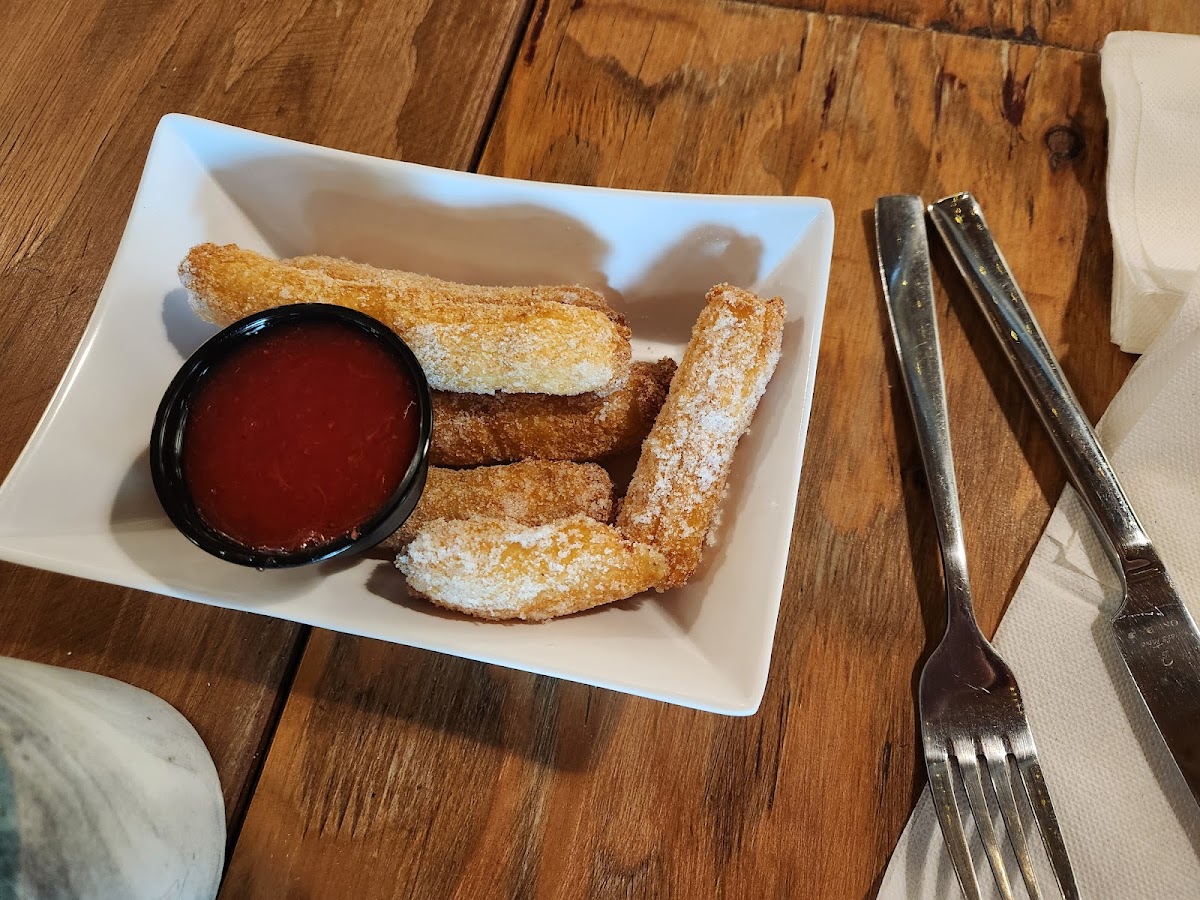 Churros with strawberry dipping sauce