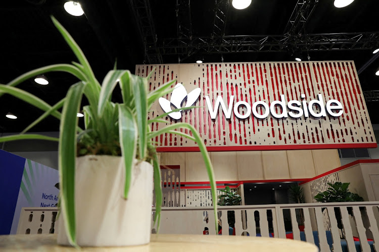 A plant decorates the booth of Australian petroleum exploration and production company Woodside Energy during the LNG 2023 energy trade show in Vancouver, British Columbia, Canada. File photo: CHRIS HELGREN/REUTERS