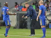 Vincent Kobola and Eric Tinkler (Coach) of Cape Town City during the Absa Premiership match between Orlando Pirates and Cape Town City at Orlando Stadium on September 20, 2016 in Soweto, South Africa.