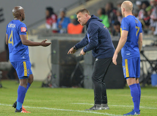 Vincent Kobola and Eric Tinkler (Coach) of Cape Town City during the Absa Premiership match between Orlando Pirates and Cape Town City at Orlando Stadium on September 20, 2016 in Soweto, South Africa.