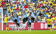 Bafana Bafana's Bernard Parker scores during South Africa's 2014 Fifa World Cup Qualifier 4-1 victory over Botswana at the Moses Mabhida Stadium in Durban on Saturday, though this could not salvage its dashed World Cup hopes