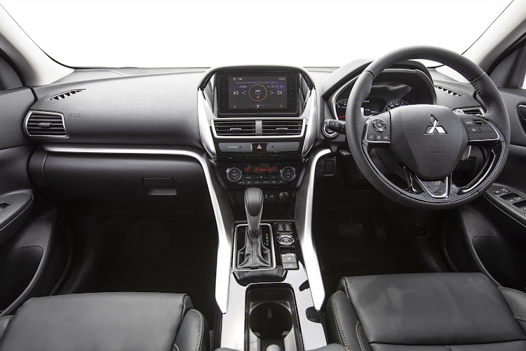 The interior is roomy and neatly appointed, with soft-touch finishes.