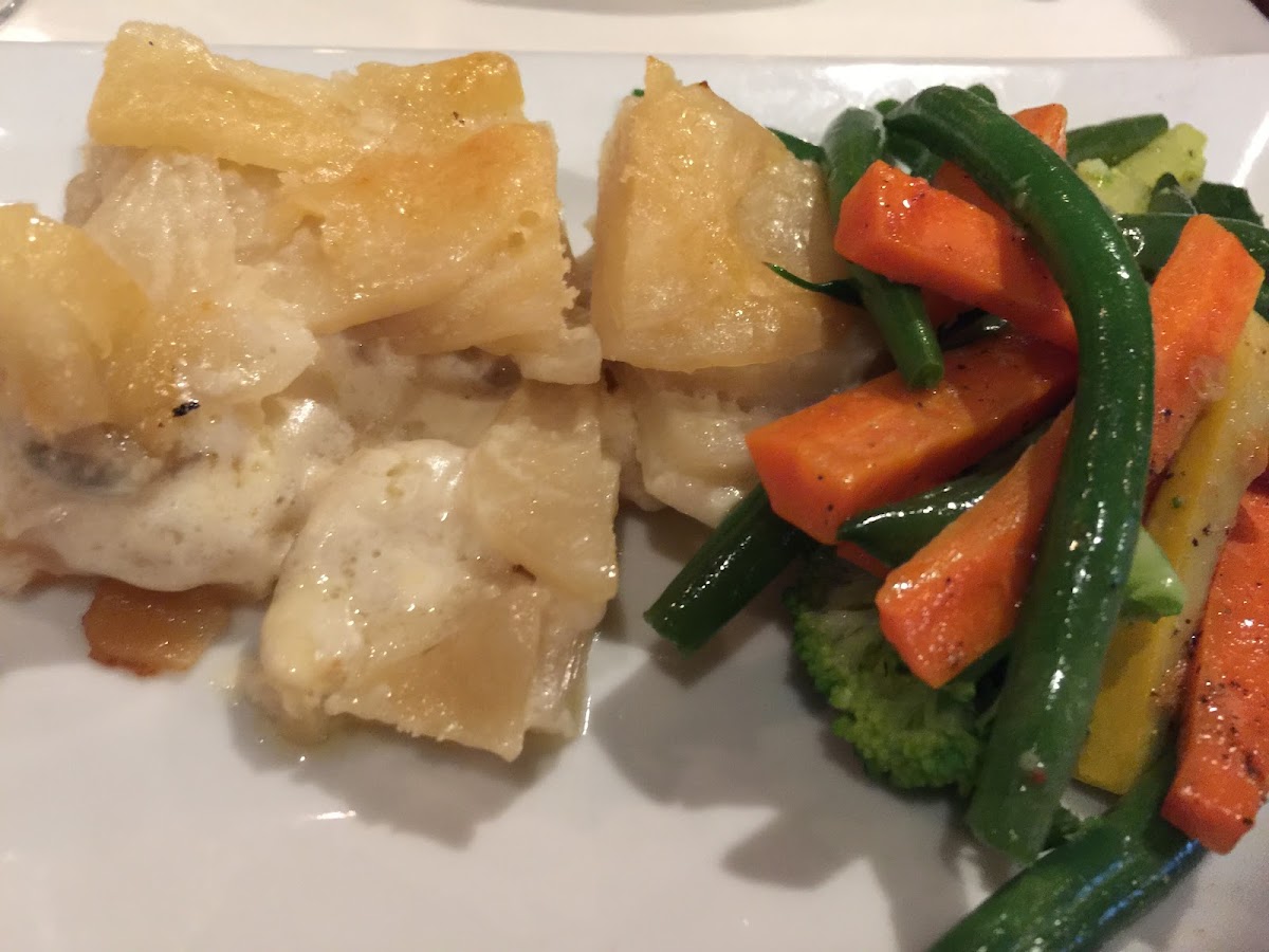As Gratin potatoes and fresh Veggies standard complement to entree’s