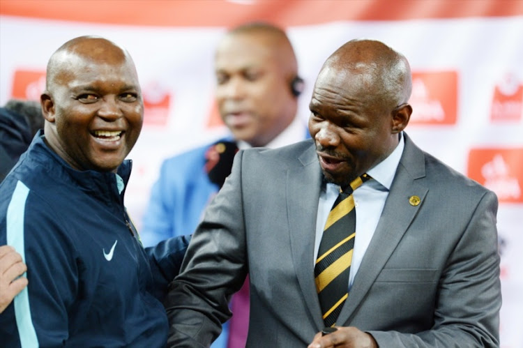 Pitso Mosimane and Steve Komphela during the Absa Premiership match between Kaizer Chiefs and Mamelodi Sundowns at FNB Stadium on January 09, 2016 in Johannesburg, South Africa.