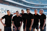 Orlando Pirates' six new signings pose for a photograph at Orlando Stadium in Soweto. 