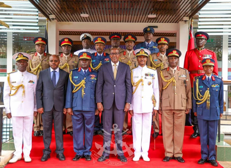 Chief of Defence Forces (CDF) General Charles Kahariri with Defence CS Aden Duale and other service men and women, during a change of guard at the DoD in Nairobi on May 7, 2024.