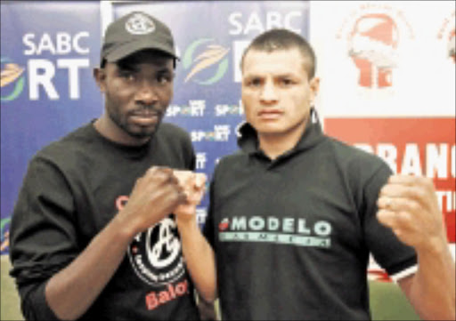 2001027VNH. Cassius Baloyi and Roberto David Arrieta during the press conference at SABC in Johannesburg.PHOTO:VELI NHLAPO. © Sowetan