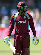 Chris Gayle of West Indies walks off for 10 runs during the 4th Momentum ODI between South Africa and West Indies at St Georges Park on January 25, 2015 in Port Elizabeth, South Africa.