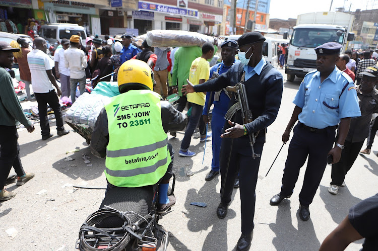 Police officers during intensified patrols ahead of Christmas festivities in Gikomba area, Nairobi on December 22, 2022