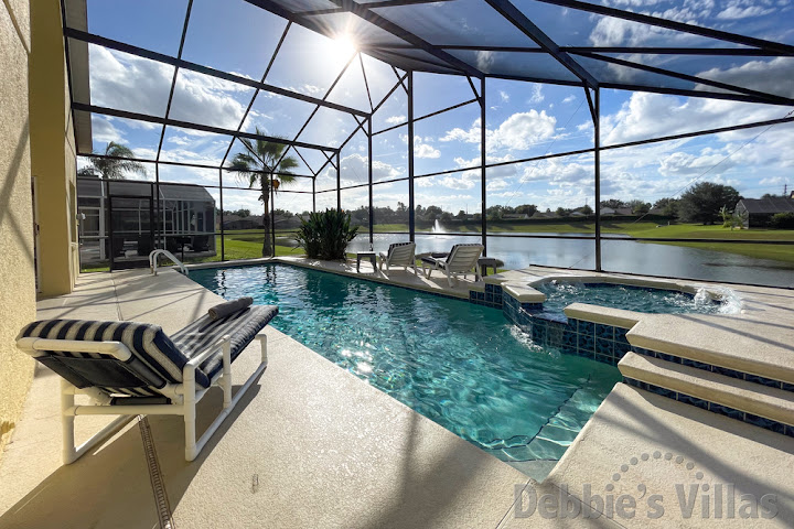 Stunning lake view from the west-facing pool and spa deck at this Rolling Hills vacation villa