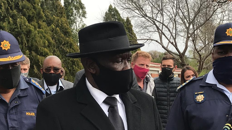 Police minister Bheki Cele visits the farming community of Normandien, KZN, on Wednesday.