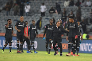 Orlando Pirates players during the Absa Premiership match between Orlando Pirates and Bidvest Wits at Orlando Stadium on August 15, 2018 in Johannesburg, South Africa. 