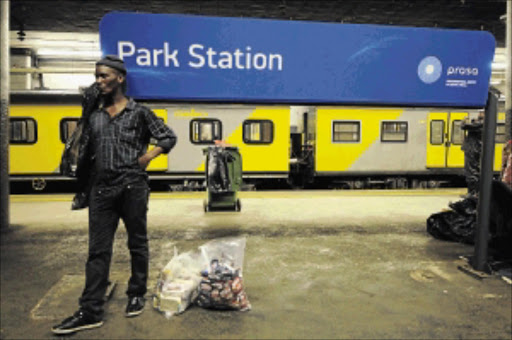 TICKET TO RIDE: Sibulelo Mxiki moves from coach to coach selling his wares to commuters travelling from Johannesburg to Vereeniging PHOTOS: THULANI MBELE