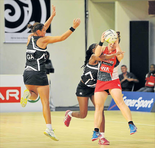NO WAY THROUGH: Arne Rust of the Eastern Cape Aloes is challenged by Elsunet du Plessis (GA) and Kalipa Gibisela of the Kingdom Stars in their 2017 Brutal Fruit Netball Premier League match played at the Durban University of Technology in Durban Picture: MUZI NTOMBELA