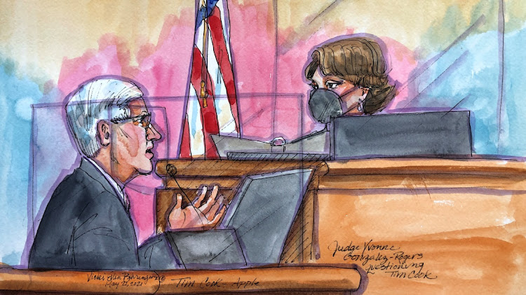 Apple CEO Tim Cook is questioned by Judge Yvonne Gonzalez Rogers as he testifies on the stand during a weeks-long antitrust trial at federal court in Oakland, California, US May 21, 2021 in this courtroom sketch.