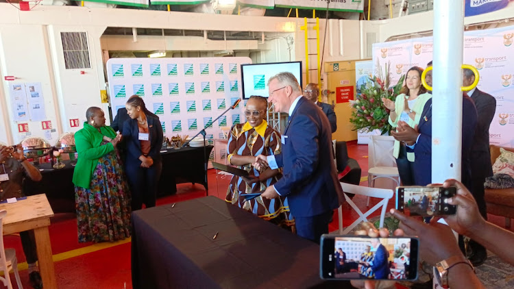 Transport minister Sindisiwe Chikunga formally hands over the SA Agulhas to its new owners, JS Maritime.