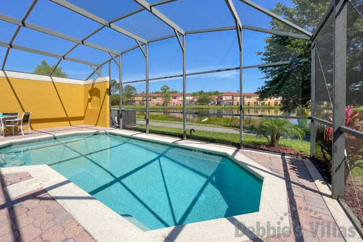 Lake view from the private pool area of this Kissimmee vacation home