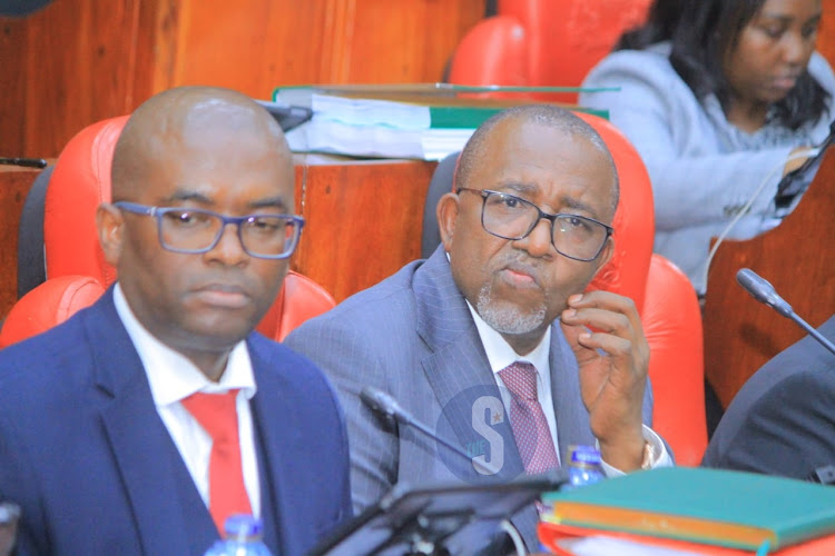 Agriculture Cabinet Secretary Mithika Linturi follows proceedings as the National Assembly select committee holds impeachment pre-trial hearing at County Hall on May 7, 2024.