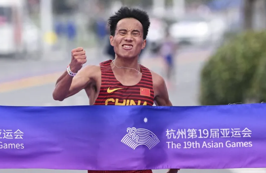 He Jie (pictured winning the 2023 Asian Games) won the half marathon in one hour, three minutes and 44 seconds