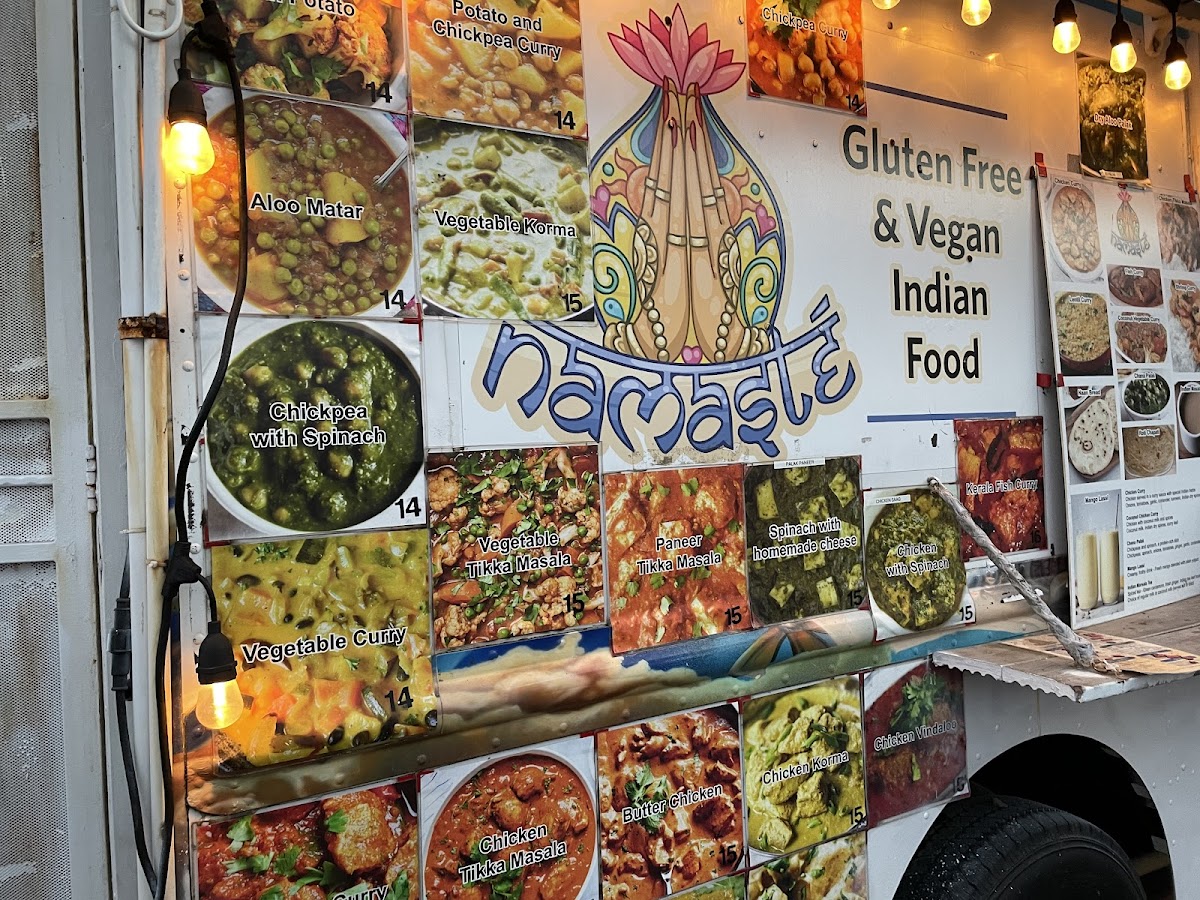 Menu on the side of the food truck.