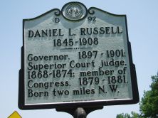 Governor, 1897-1901; Superior Court judge, 1868-1874; member of Congress, 1879-1881. Born two miles N.E.Plaque via North Carolina Highway Historical Marker Program, and is used with their...