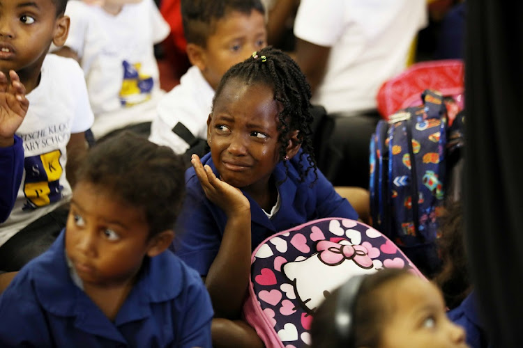 A Grade 1 pupil in tears on the first day of school at the Schotche Kloof Primary.
