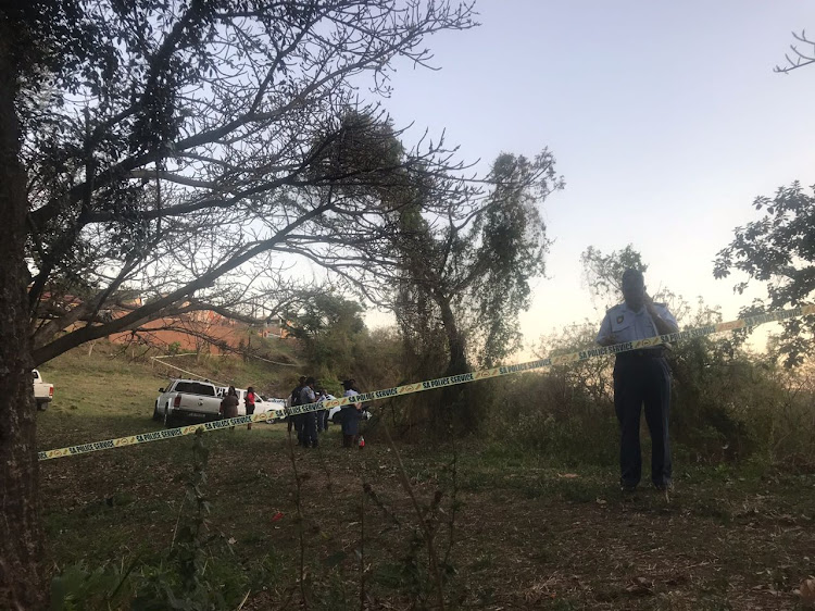 Police cordon off an area of bush in Phoenix, north of Durban, after the body of a child - believed to be that of missing schoolboy Miguel Louw - was discovered on Monday afternoon.