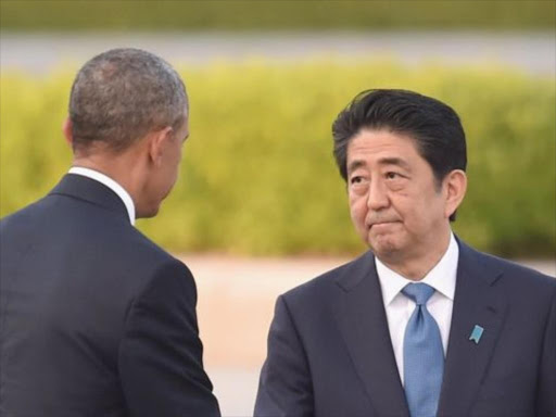 US President Barack Obama with Shinzo Abe when the former visited Hiroshima in May. /BBC