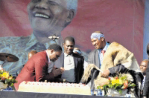 ICON CELEBRATED: Deputy President Kgalema Motlanthe, Deputy Minister of Arts and Culture Paul Mashatile and Chief Zwelivelile Mandela during Nelson Mandela's 91st birthday celebrations in Newtown, Johannesburg, on Saturday. PIC: VATHISWA RUSELO. 19/02/2009. © Sowetan.