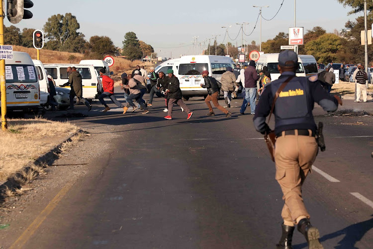 Police used rubber bullets to disperse taxi drivers who were protesting