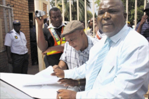 HARD TIMES: Nkomazi executive mayor Johan Mavuso (with tie) shortly after receiving a memorandum that accused his municipality of massive corruption last year. PHOTO: Riot Hlatshwayo. 06/06/3010. © Sowetan.