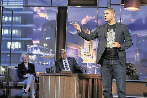 Johannesburg comedian Trevor Noah on The Tonight Show on Friday night, watched by actress Glenn Close and host Jay Leno.