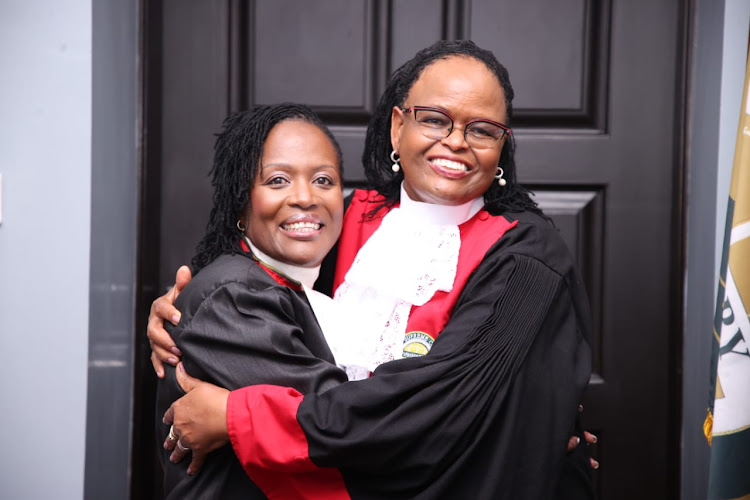 Chief Justice Martha Koome embraces Chief Registrar of Judiciary Winfridah Boyani Mokaya at Supreme Court during her swearing-in ceremony on March 25, 2024.