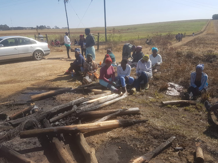 Kranskop community members outside the Aussicht Farm after tensions flared on August 6 2018.