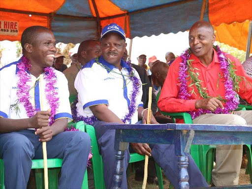 David Rogony (CCM candidate for Sigowet/Soin constituency) Bomet governor Isaac Rutto and Paul Sang(a KANU candidate for Buret constituency) .The trio were having joing campaign meeting at Cheptuiyet market in Sigowet on Saturday./Sonu Tanu.