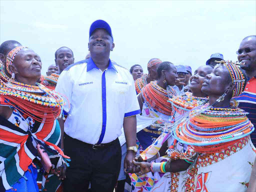 Bomet Governor Isaac Rutto joins Samburu women in a dance at Archers Post on June 6 /KIPYEGON CHIRCHIR/BGPS