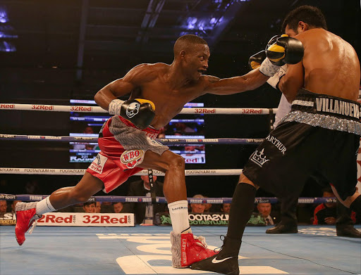 Zolani Tete (L) in action against Arthur Villanueva in a Final Eliminator for the WBO World Bantamweight Championship at the Leicester Arena on April 22, 2017 in Leicester, England. (Photo by Nigel Roddis/Getty Images)