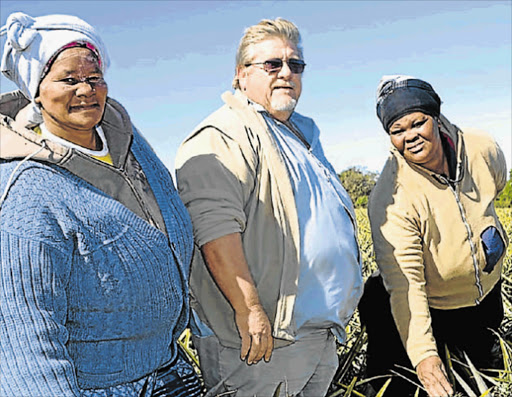 VIABLE: Linda Abrahams, left, and Ntombekhaya Vulindlu are beneficiaries of a thriving 50/50 redistribution project at Bathurst, with Birbury farm manager Bruce Thompson