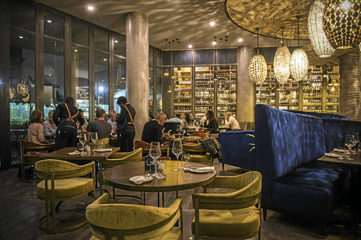 Elegance and African opulence are the order of the day at Epicure, a high-end African restaurant in Sandton, Johannesburg.