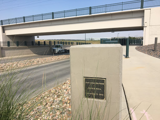 "Just Lower the Road  |  Marie E. Sera  |  November 12, 2013". It was hot and noisy I just wanted to keep walking. The sign for this train bridge registered in my periphery and a number of steps...