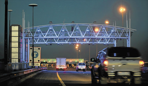 UNDER FIRE: One of the new toll gantries on the N17 near Germiston built by Tolplan Picture: SIMON MATHEBULA