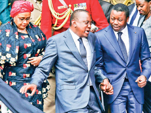 First Lady Margaret Kenyatta, President Uhuru Kenyatta and Togo’s President Faure Eyadéma Gnassingbé leave Nyayo Stadium after the Jamhuri Day celebrations yesterday / REUTERS/ THOMAS MUKOYA