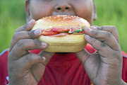 Child obesity has become a health hazard in this country with more people eating junk food, says the writer. 